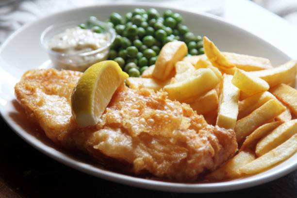fish, chips and peas stock photo