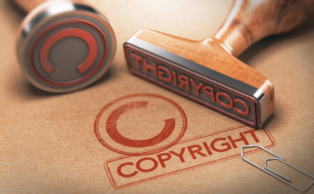 Copyrighted Material, Intellectual Property Copyright 3D illustration of two rubber stamps with copyright word and symbol over kraft paper background, Concept of copyrighted material education registration event stock pictures, royalty-free photos & images