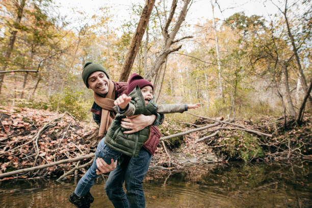 istock Dad and daughter having fun outdoor together 878447260