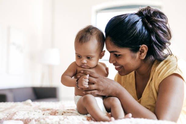 istock Mom and baby indoor 878447364