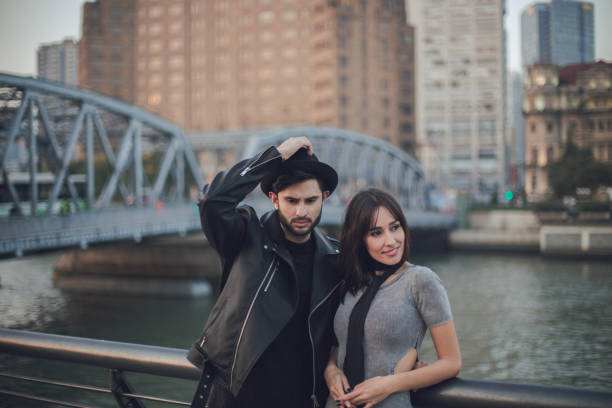 istock Young couple by the river 878460014