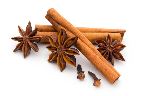 istock Cloves, anise and cinnamon isolated on white background. 878464524