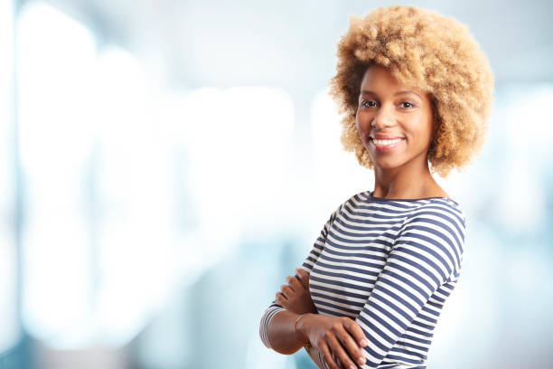 istock Professional young woman in the office 878467346
