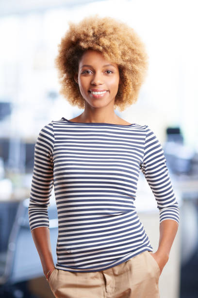 istock Businesswoman standing in the office 878467358