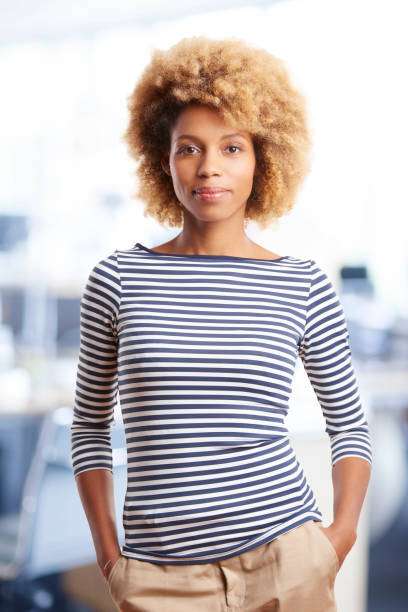 istock Businesswoman standing in the office 878467372