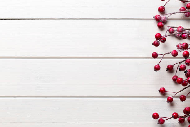 istock Christmas decor on the wooden white background. 878467466