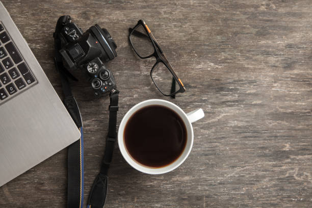 istock Business still life on old wooden table 878468736