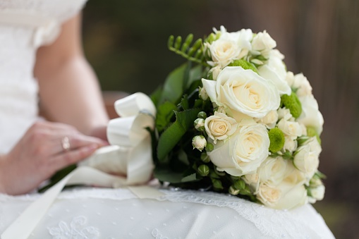 Wedding flowers and wedding rings, lotus wedding flowers.