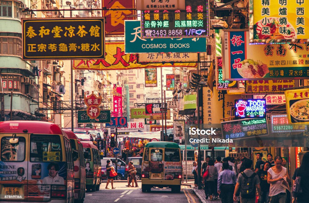 Hong Kong Street Scene, Mongkok District with busses Hong Kong Stock Photo