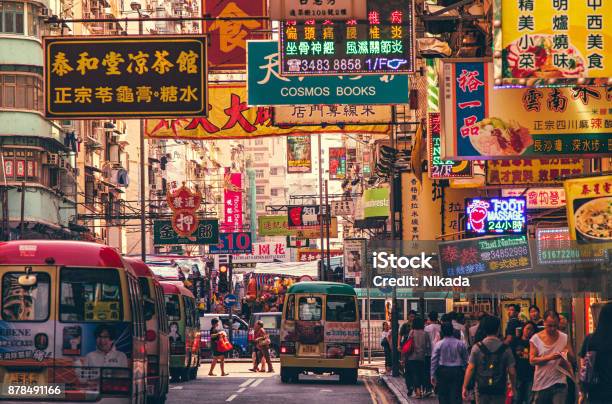 Hong Kong Street Scene Mongkok District With Busses Stock Photo - Download Image Now