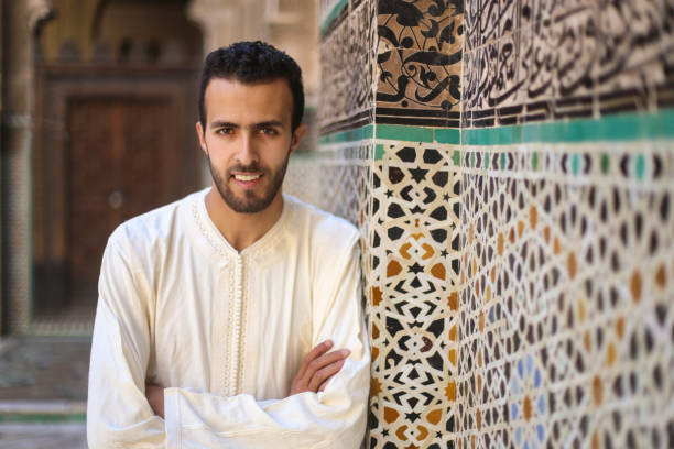 istock Smiling Arab man in traditional clothing 878493472