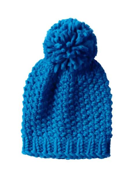 Blue woolen winter cap hat with a pom pom pompon isolated on white