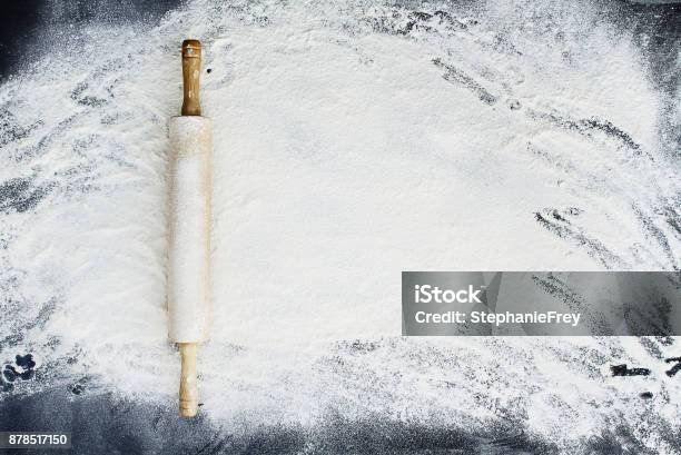 Rolling Pin Over Flour Background Stock Photo - Download Image Now - Flour, Baking, Backgrounds