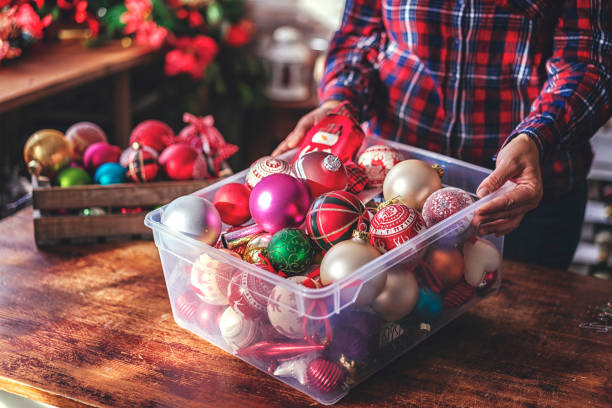 istock Decorating Christmas Tree with Ornaments and Christmas Lights 878523482