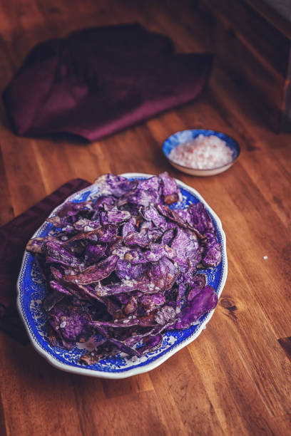 istock Homemade Purple Potato Chips 878523498