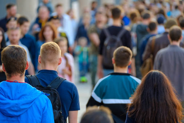 istock Crowd of people on the street. 878524728