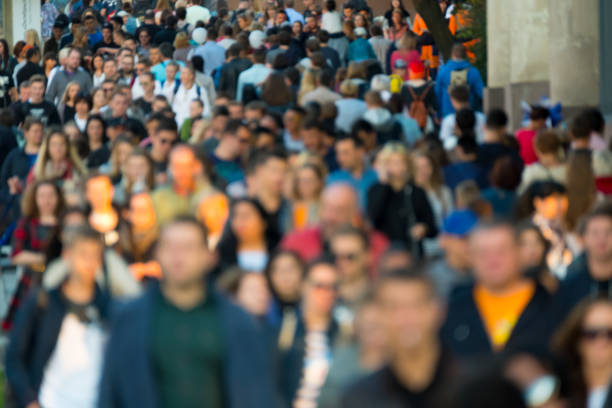 istock Crowd of people on the street. 878533800