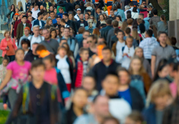istock Crowd of people on the street. 878533894