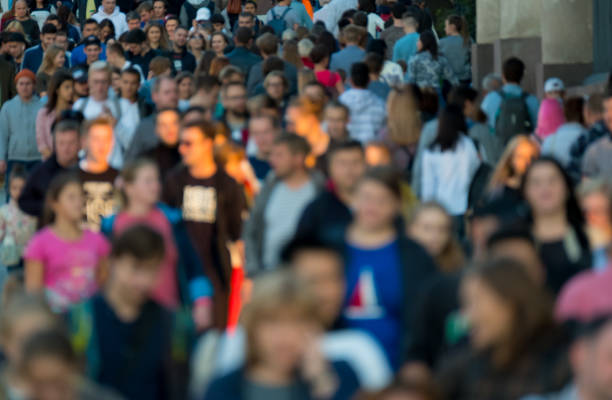 istock Crowd of people on the street. 878533956
