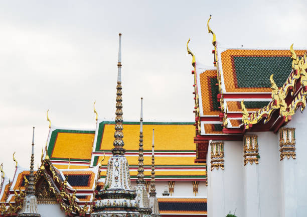 istock Colored bright roofs of Wat Pho, Bangkok, Thailand 878544642