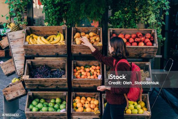 Woman Choosing Fresh Fruits On The Street Of Florence Stock Photo - Download Image Now
