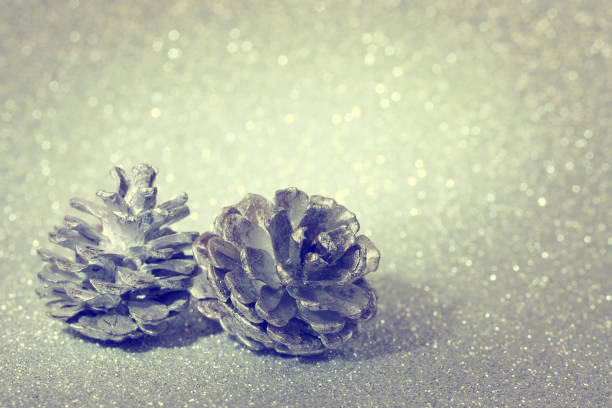 istock Christmas and new year shiny background, silver cones 878559606