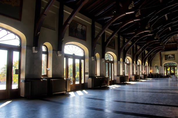 istock light shining through the doors of a train station 878566254
