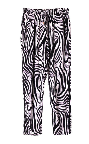 istock Female animal print trousers isolated. 878578902