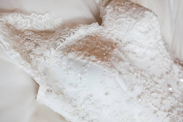 istock Wedding Dress on Bed 878592442