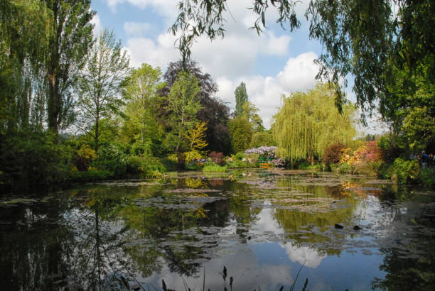 Monets Garden Reflections in the lake of Monets Garden foundation claude monet photos stock pictures, royalty-free photos & images