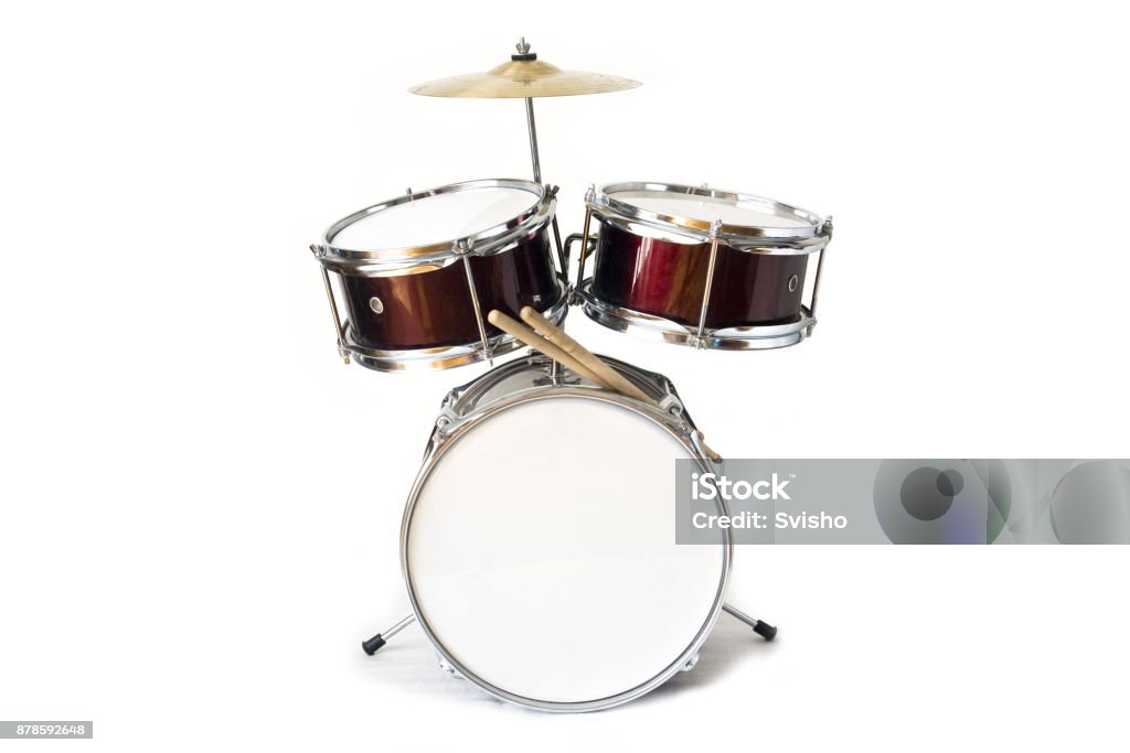 Drum kit isolated on white background Set of three drums with cymbal and drum sticks Drum Kit Stock Photo