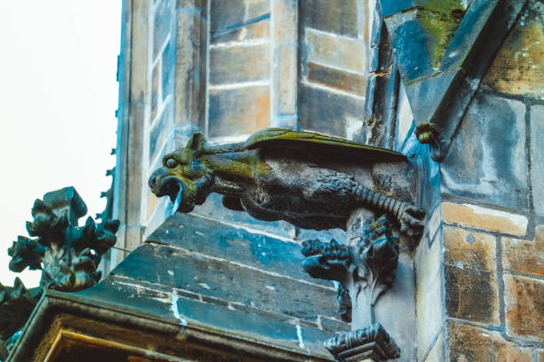 istock Czech architecture, scary gargoyle sculpture, gothic temple decoration. 878602548