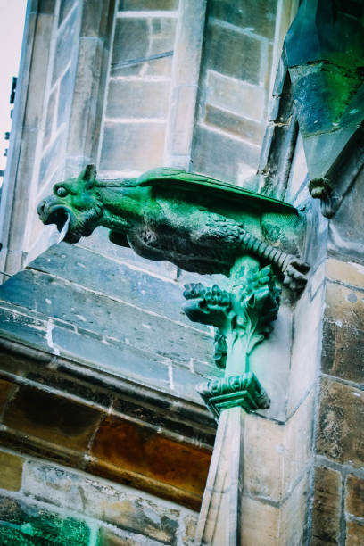 istock Czech architecture, scary gargoyle sculpture, gothic temple decoration. 878602556
