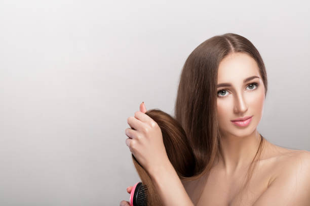 istock woman with long hair. 878614158