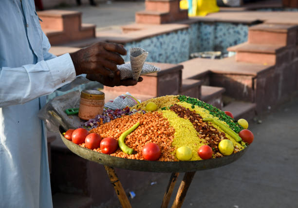 istock Man selling spices and vegetables. 878619584