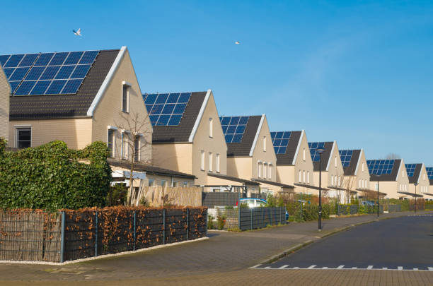 houses with solar panels stock photo