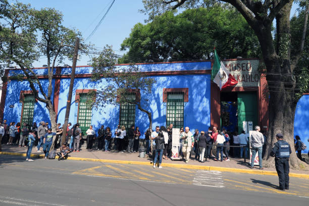 Frieda Kahlo Museum Mexico City, Mexico - Oct. 28, 2017:  People wait in line to enter the Frida Kahlo Museum, also known as the Casa Azul, or Blue House.  The house was Kahlo's residence for most of her life. frida kahlo museum stock pictures, royalty-free photos & images