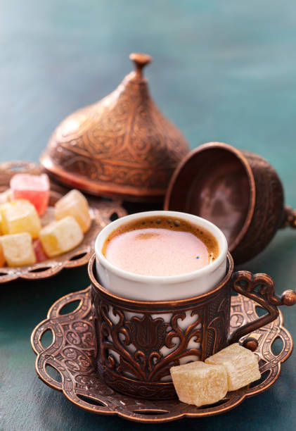 traditional turkish coffee  and turkish delight on dark green wooden background. - coffee table non alcoholic beverage turkish coffee black coffee imagens e fotografias de stock