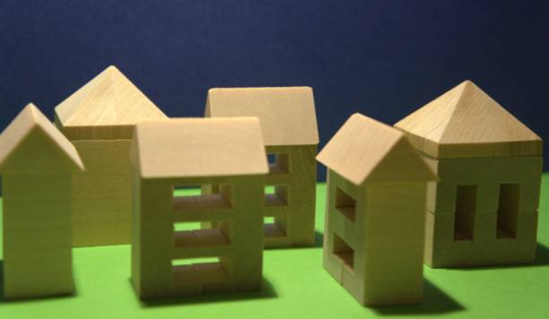 istock Wooden houses construction 878647710