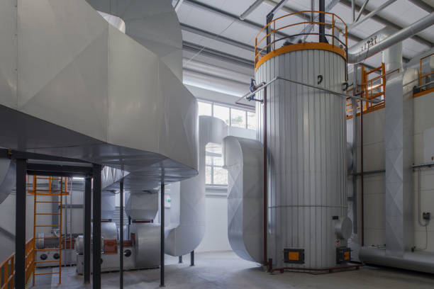istock Modern boiler room on the wooden chips. 878659384