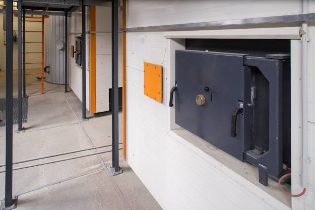 istock Modern boiler room on the wooden chips. 878659396
