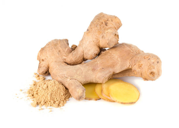 istock Ginger root and ground ginger isolated on white background. Close up 878659488