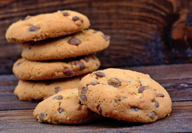 istock Chocolate chip cookies on wooden background 878659580