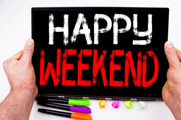 istock Happy Weekend text written on tablet, computer in the office with marker, pen, stationery. Business concept for Holiday Day Off Celebration white background with copy space 878671758