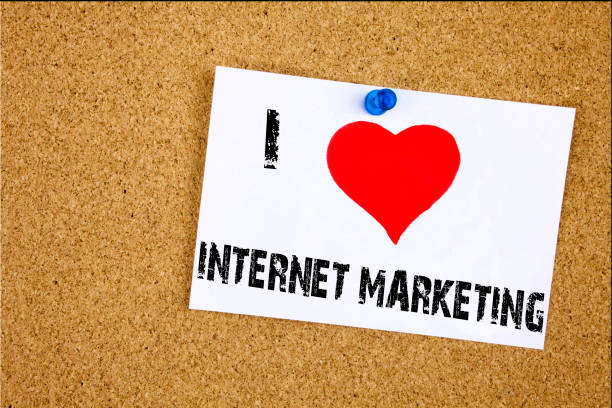 istock Hand writing text caption inspiration showing I Love Internet Marketing concept meaning Technology Strategy Design Loving written on sticky note, reminder isolated background with copy space 878677154