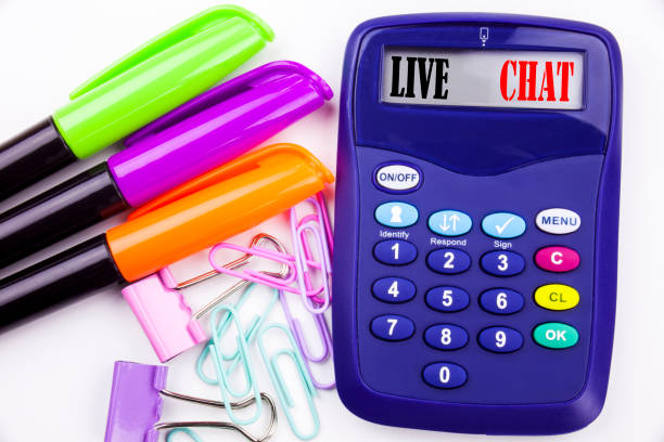 istock Writing word Live Chat text in the office with surroundings such as marker, pen writing on calculator. Business concept for Chatting Communication Digital Web Concept white background with copy space 878677610
