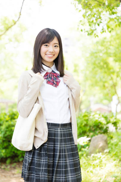 istock asian school girl in park 878686274