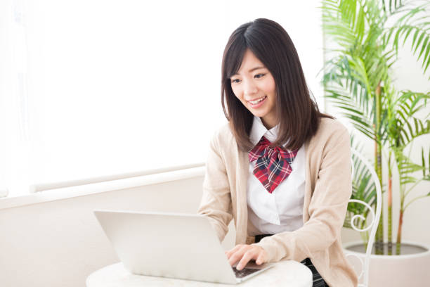 istock asian school girl studying 878686294