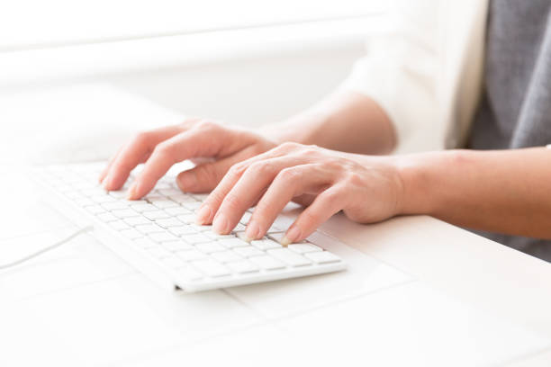 istock asian businesswoman using keyboard in office 878686366