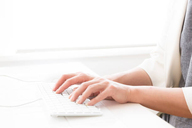 istock asian businesswoman using keyboard in office 878686368